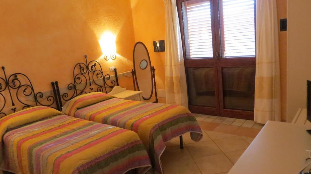 Hotel Il Viandante San Teodoro  Pokoj fotografie